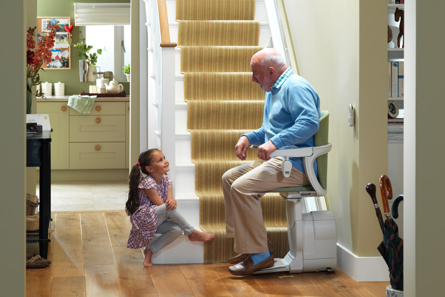 child talking to main on residential stairlift image