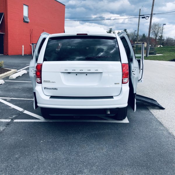 rear exterior view of open braunability minivan