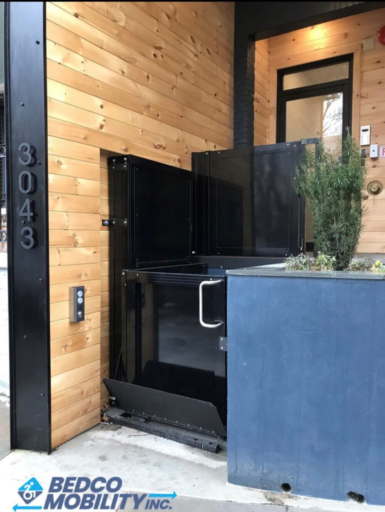 side photo of platform wheelchair lift on bedco mobility website