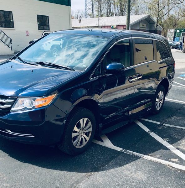 driver side view of honda minivan exterior