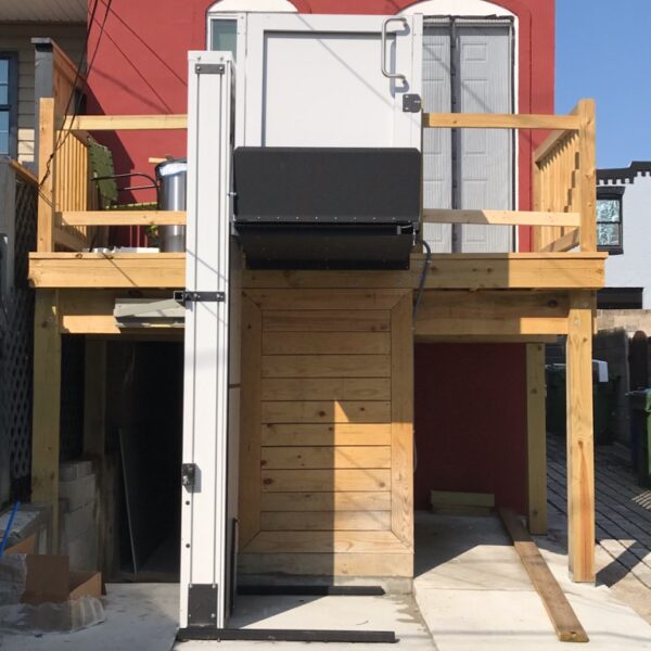 residential porch lift raised at top landing